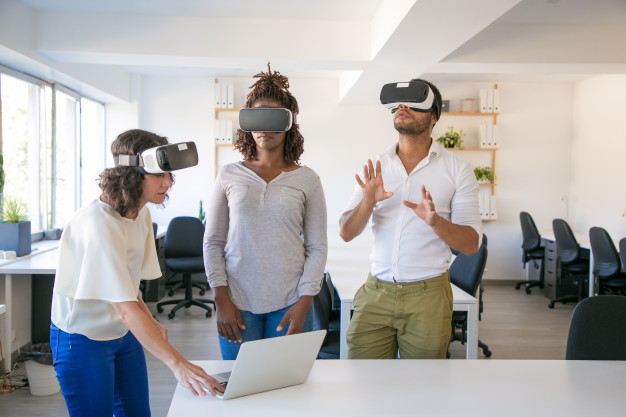 diverse-team-three-watching-virtual-presentation_74855-2146